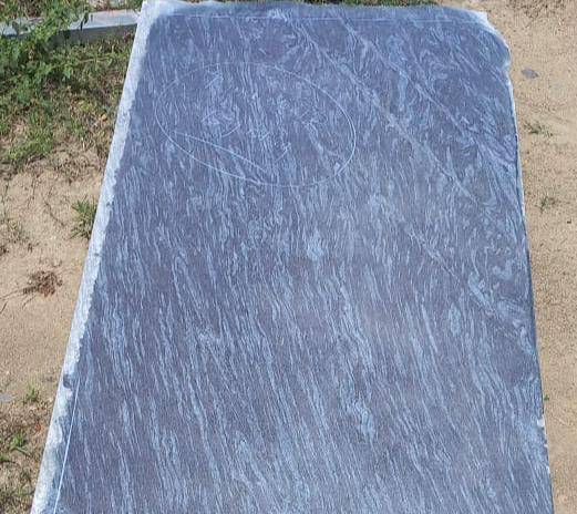 Honed Silk Blue slab with template marking